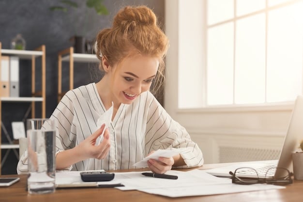 A person reviewing financial documents and using a calculator at a desk, emphasizing budgeting and financial analysis.
