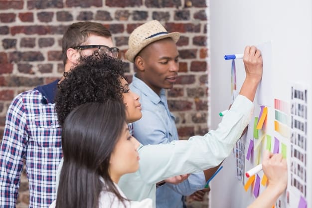 A team of diverse professionals engaged in a dynamic discussion around a whiteboard filled with strategic plans and ideas.