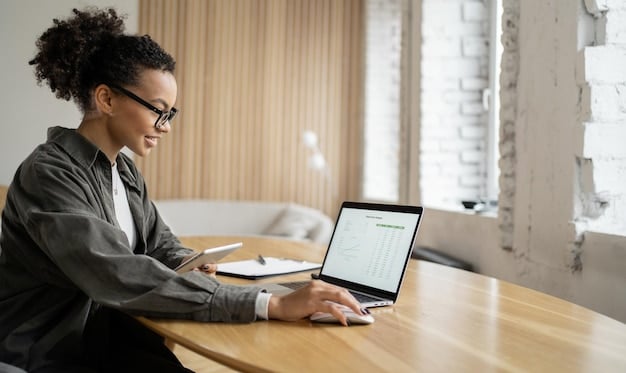 A person sitting at a desk, using a laptop with a secure website for credit reporting displayed. The person is carefully reviewing the information on the screen, with a pen in hand, ready to take notes. The scene is lit warmly, highlighting the focus and security of the task.