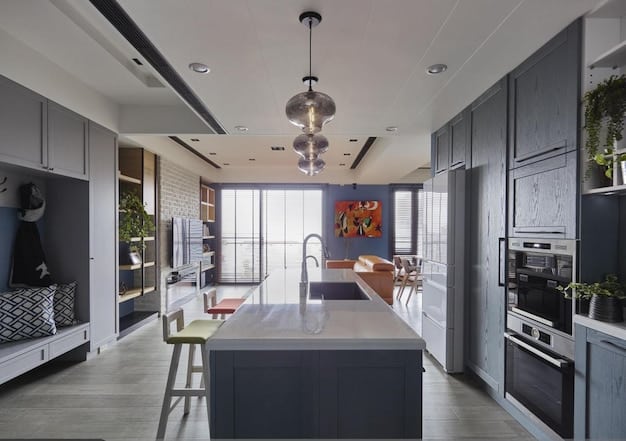 Interior shot of a modern, newly constructed kitchen in a model home, showcasing energy-efficient appliances and contemporary design.