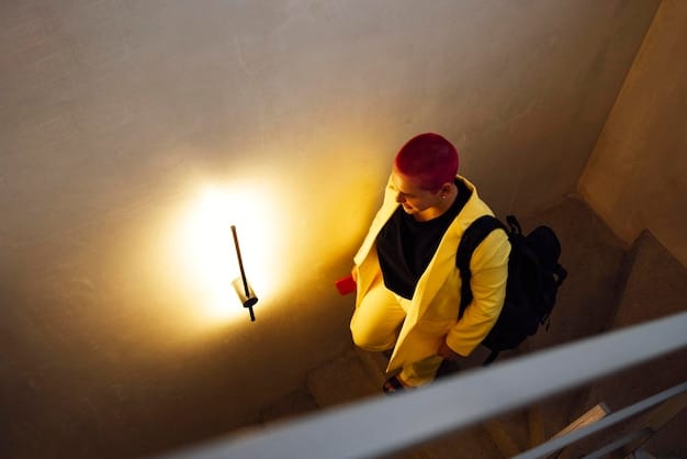 A home inspector in a hard hat carefully examining the electrical panel of a new home with a flashlight, looking for any potential hazards.